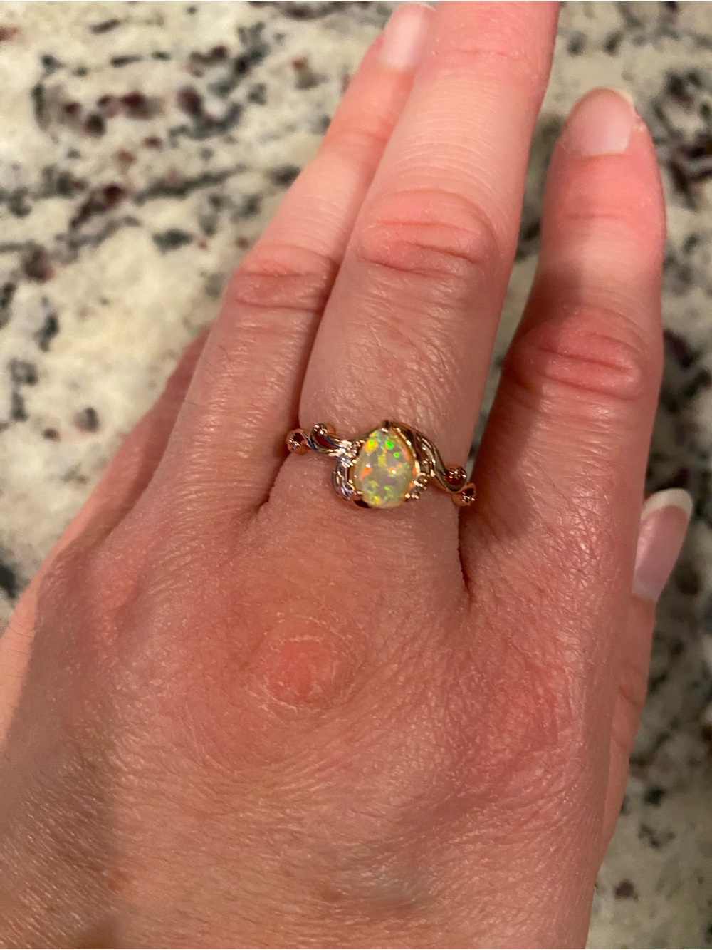 Opal Teardrop Gold Ring angel wings detail - Iridescent Opal Solitaire